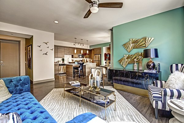 Spacious living room with modern decor in Constellation Apartments