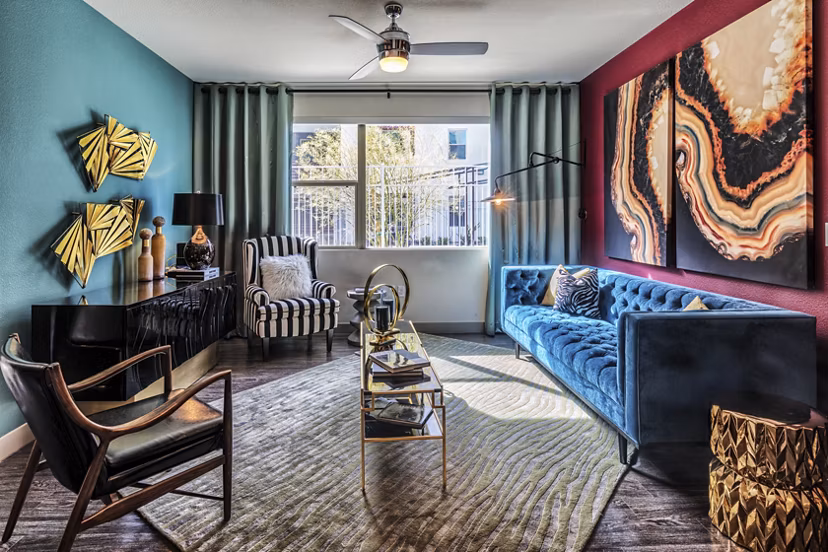 Modern living room with sleek furnishings in Constellation Apartments, ideal for luxury living at Greystar's sophisticated community