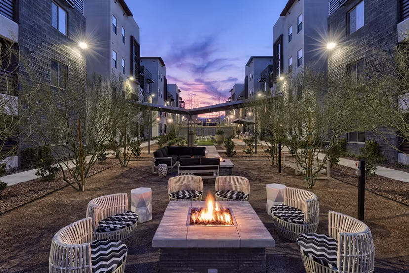 Fire pit with cozy seating area at Constellation Apartments, a Greystar luxury property