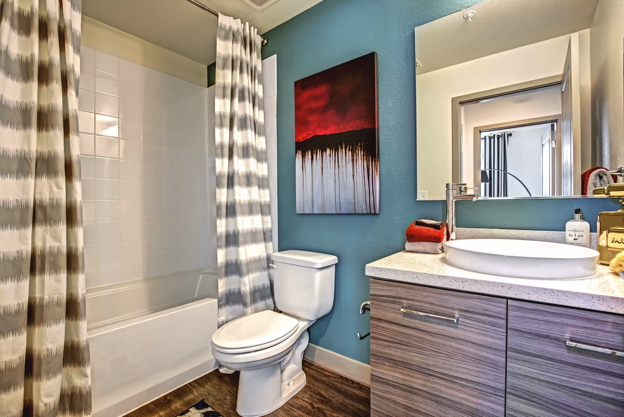 Modern bathroom with marble countertops at Constellation Apartments, part of Greystar luxury apartment collection