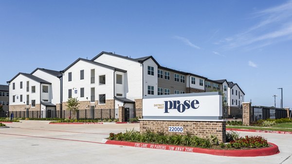 Prose District West Apartments: Signage on modern luxury apartments in a vibrant area