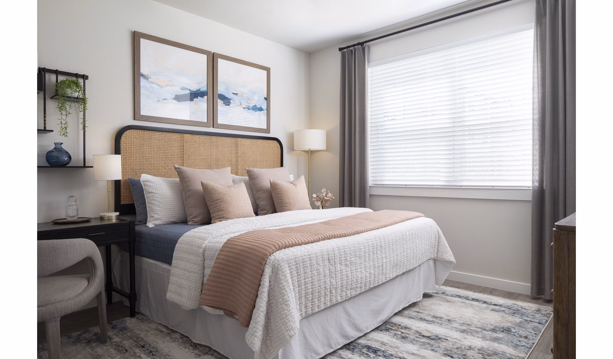 Bedroom featuring modern decor and natural light at Prose District West Apartments
