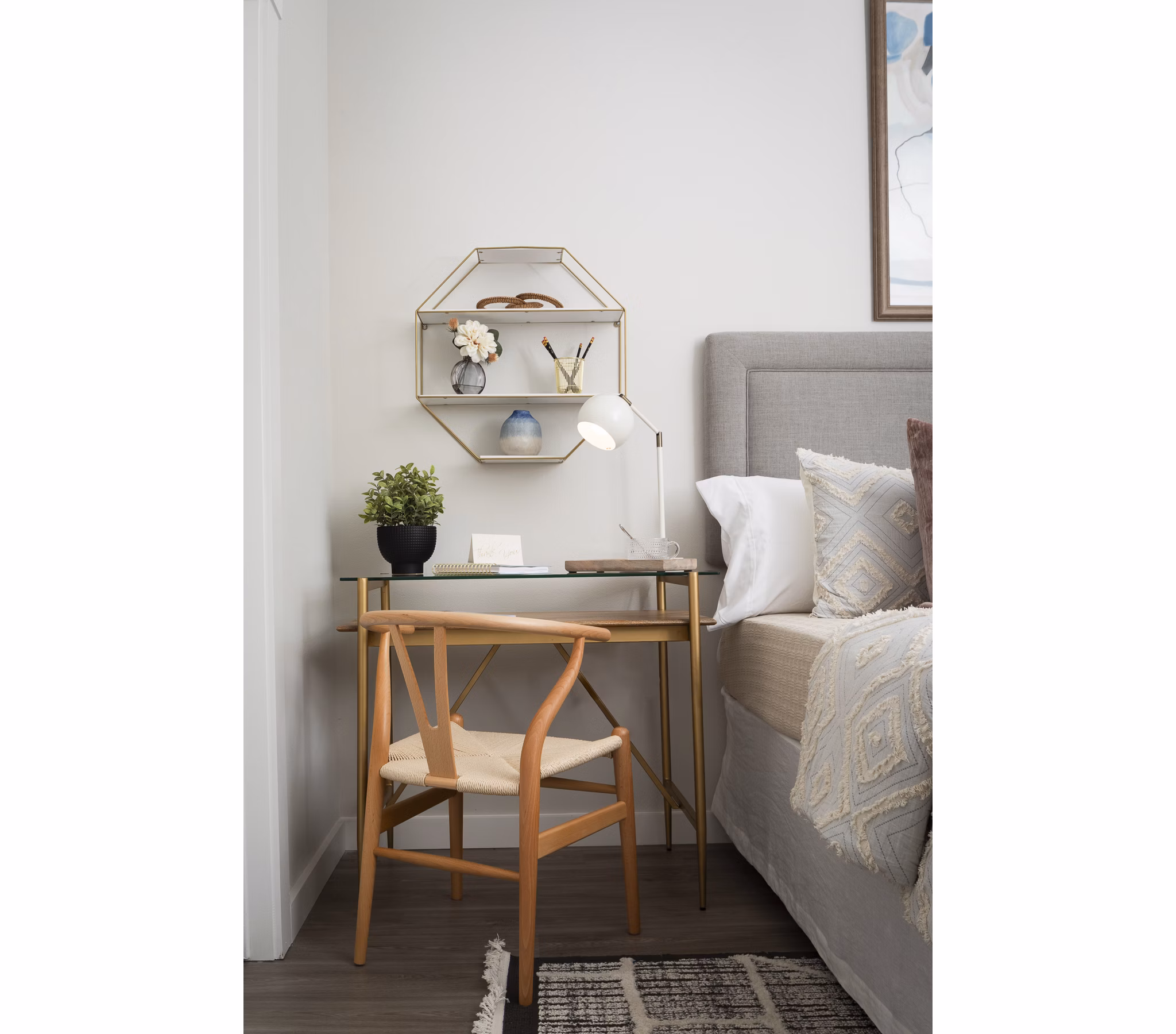 Bedroom featuring modern decor and large windows in Prose District West Apartments