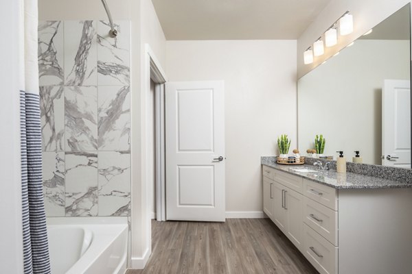 Bathroom featuring modern fixtures at Prose District West Apartments