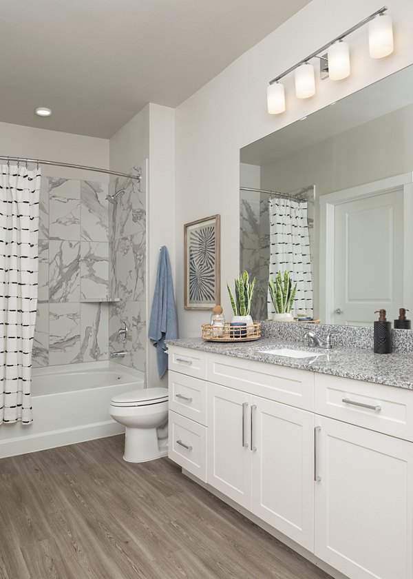 Modern bathroom with sleek fixtures at Prose District West Apartments
