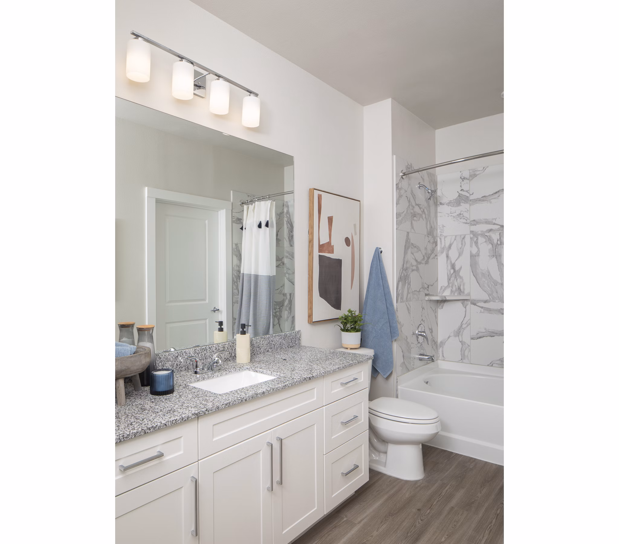 Luxurious bathroom with modern fixtures at Prose District West Apartments