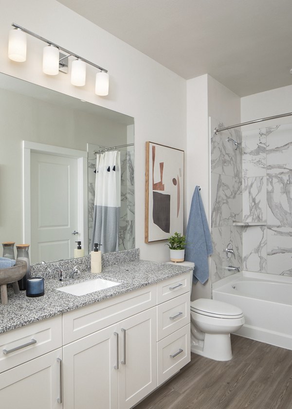 Luxurious bathroom with modern fixtures at Prose District West Apartments