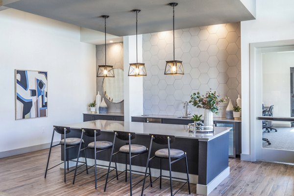 Modern clubhouse featuring cozy seating and open layout at Prose District West Apartments
