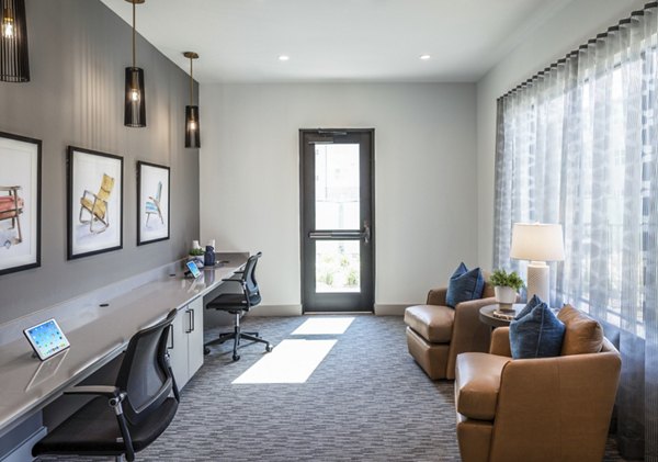 Clubhouse business center with modern workstations at Prose District West Apartments Luxurious amenities for residents seeking convenience and style