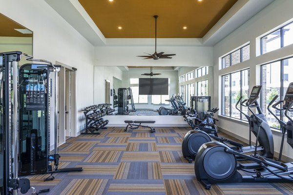 State-of-the-art fitness center with modern equipment at Prose District West Apartments
