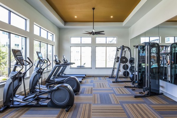 Modern fitness center with state-of-the-art equipment at Prose District West Apartments luxury community