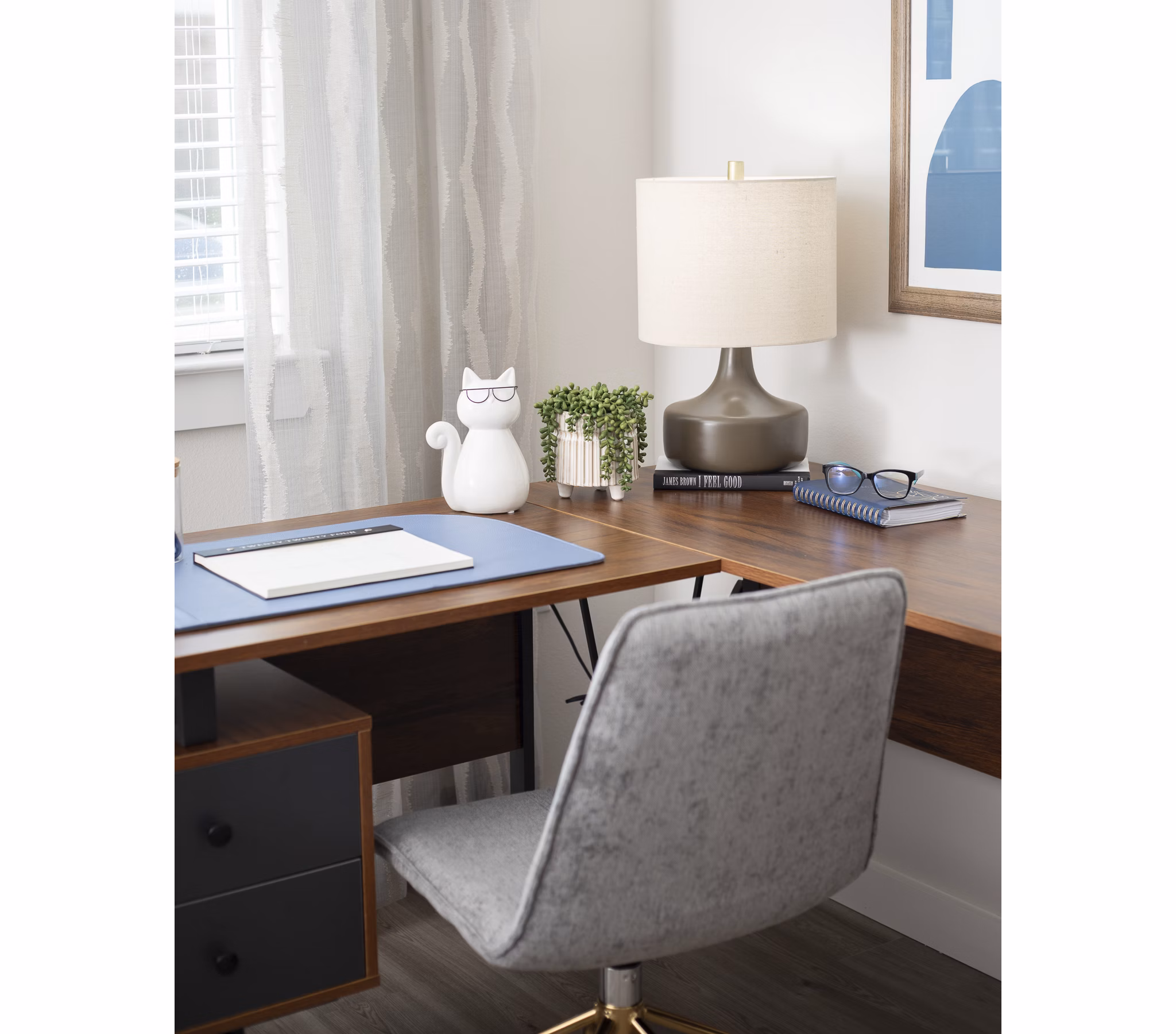 Home office featuring modern desk and ergonomic chair at Prose District West Apartments