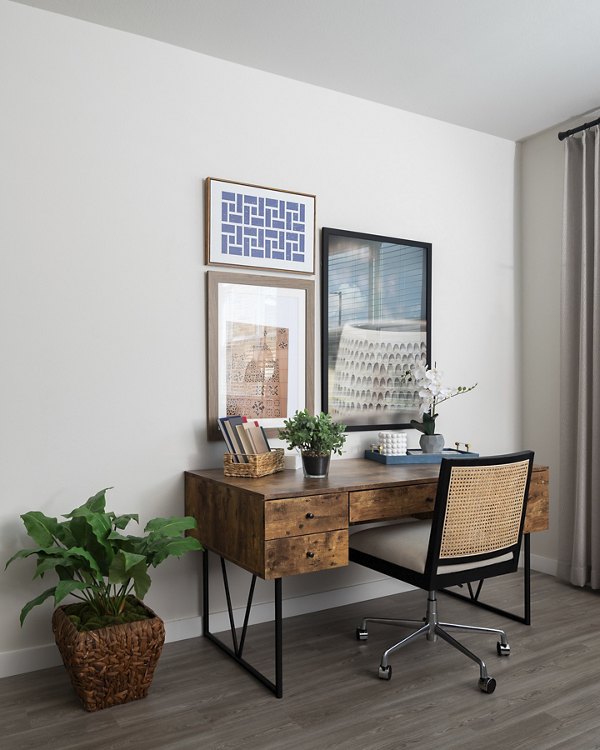 Home office featuring modern desk and ergonomic chair at Prose District West Apartments
