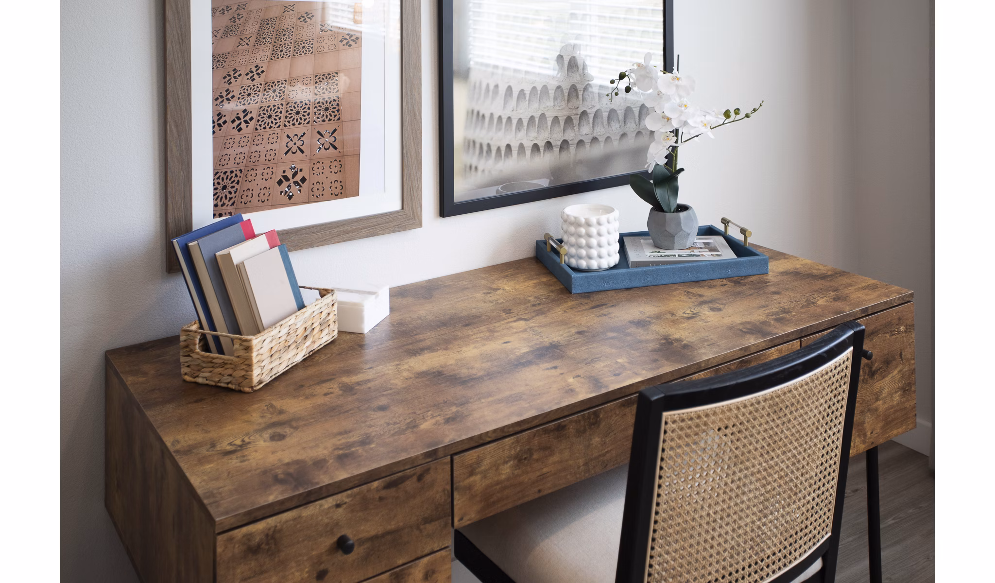 Home office with ergonomic chair and desk at Prose District West Apartments