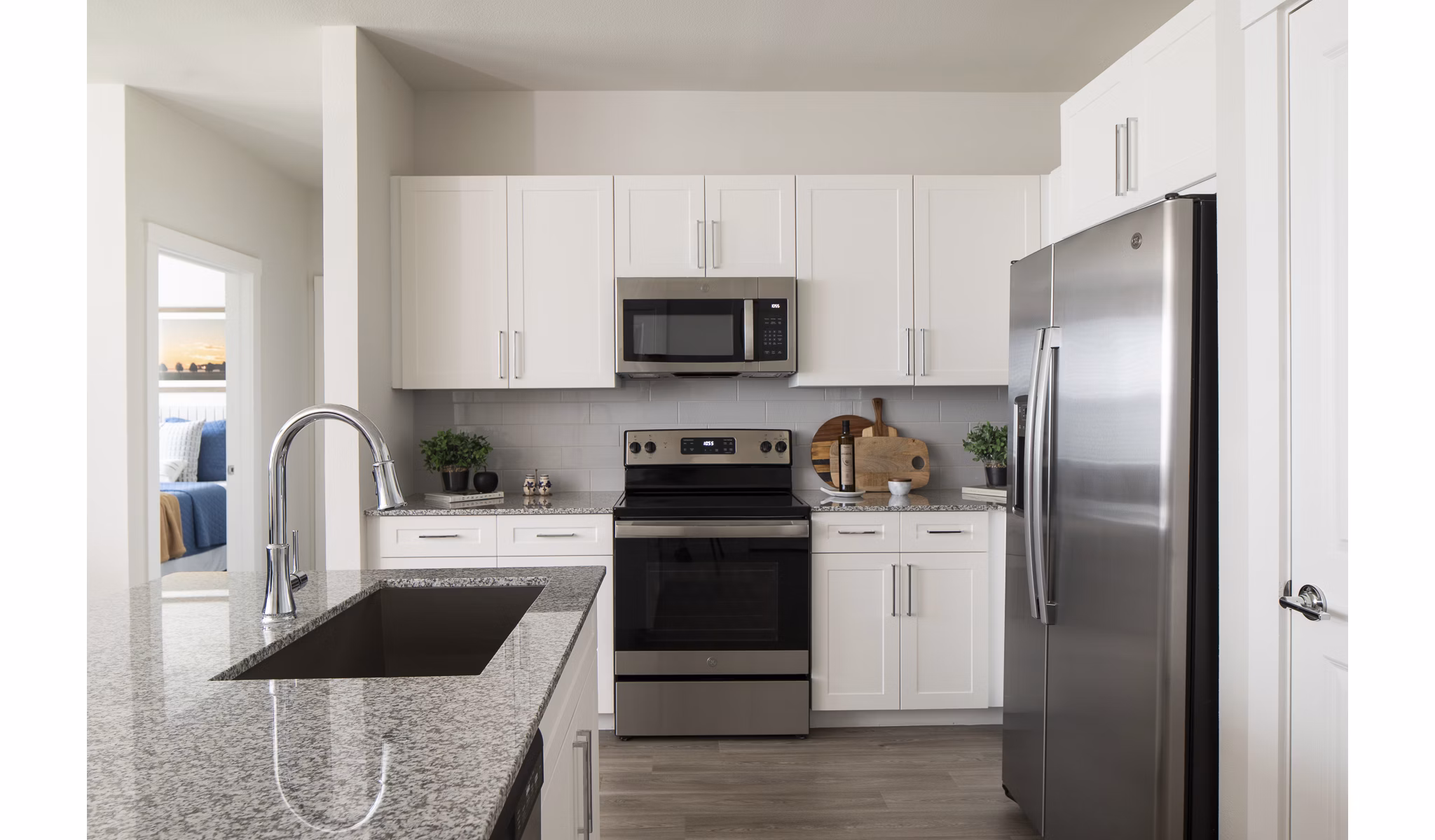 Modern kitchen with stainless steel appliances in Prose District West Apartments, Greystar's luxury living community