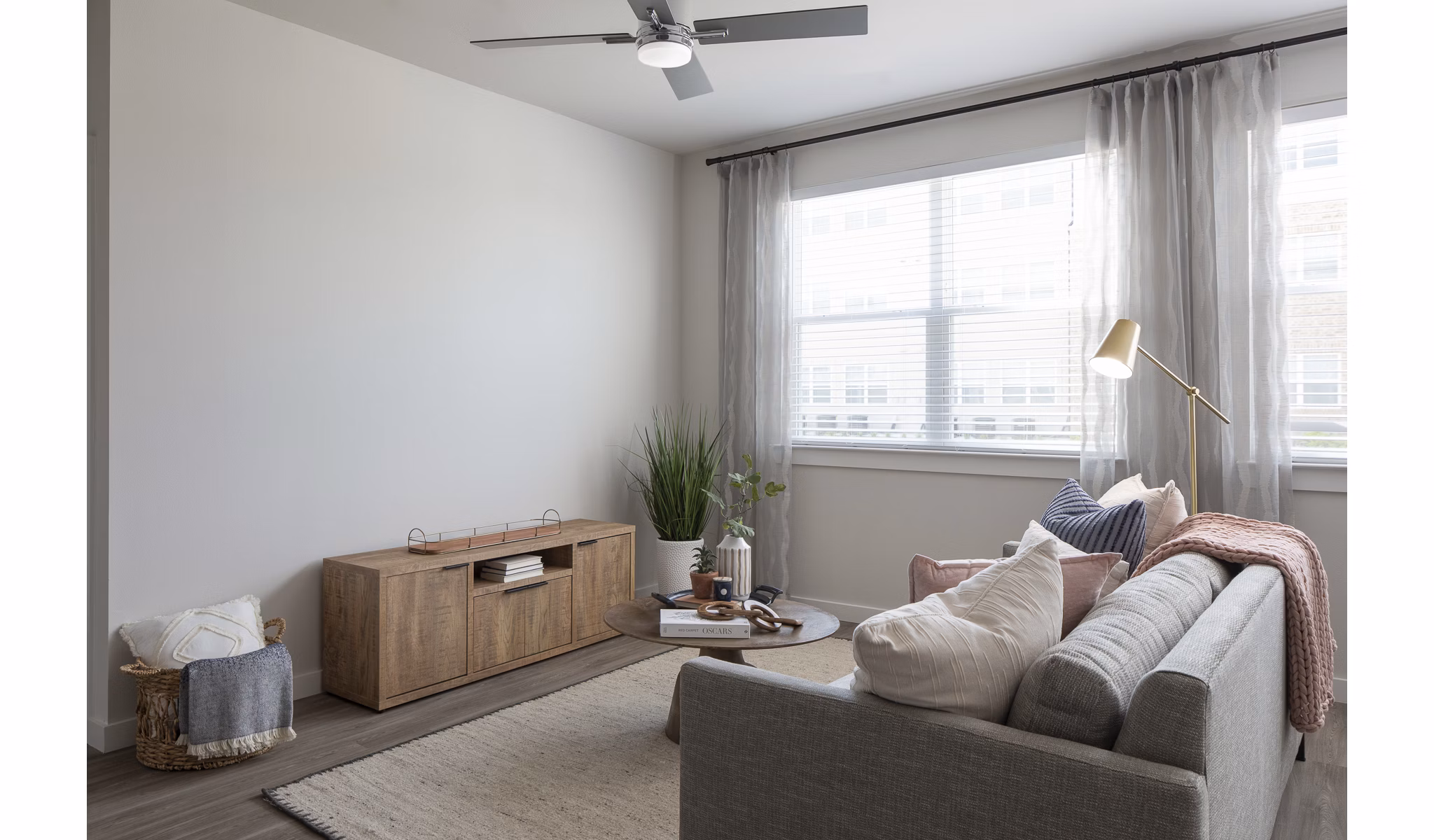 Modern living room with stylish decor in Prose District West Apartments, offering comfort and elegance for luxury living