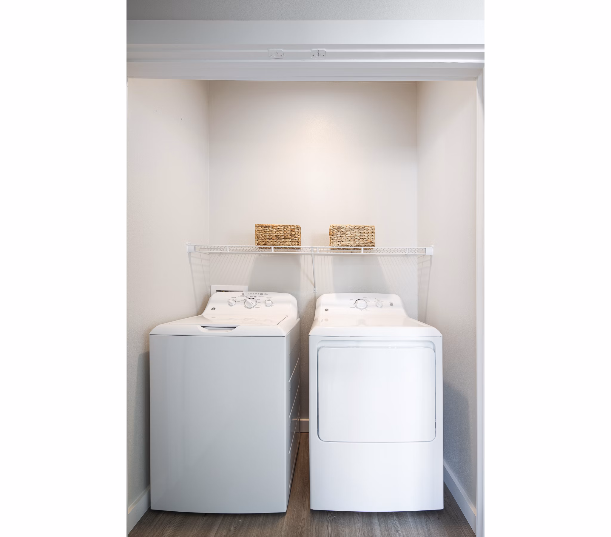Laundry room featuring modern appliances in Prose District West Apartments