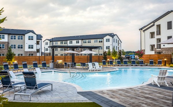 Modern pool with lounging areas at Prose District West Apartments