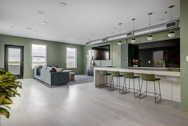 Modern clubhouse with stylish seating and community spaces at Bowers Apartments