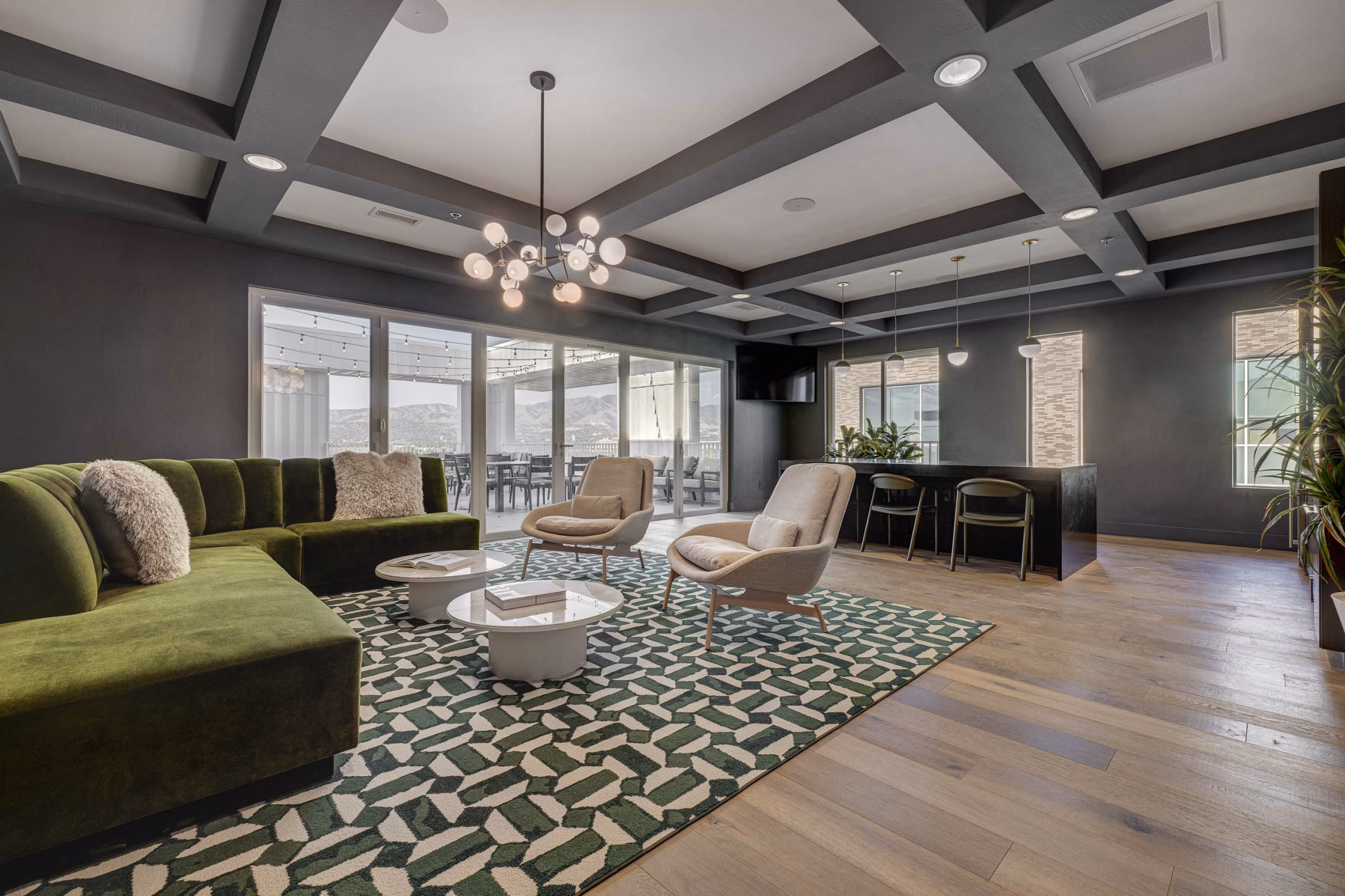 Clubhouse featuring modern furnishings and communal spaces at Bowers Apartments in a luxury setting