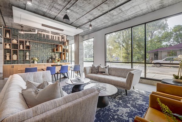 Clubhouse featuring modern design and cozy seating at Bowers Apartments, a Greystar luxury community