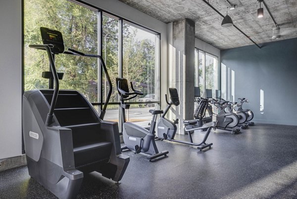 Fitness center with state-of-the-art equipment at Bowers Apartments, offering a variety of exercise options for residents