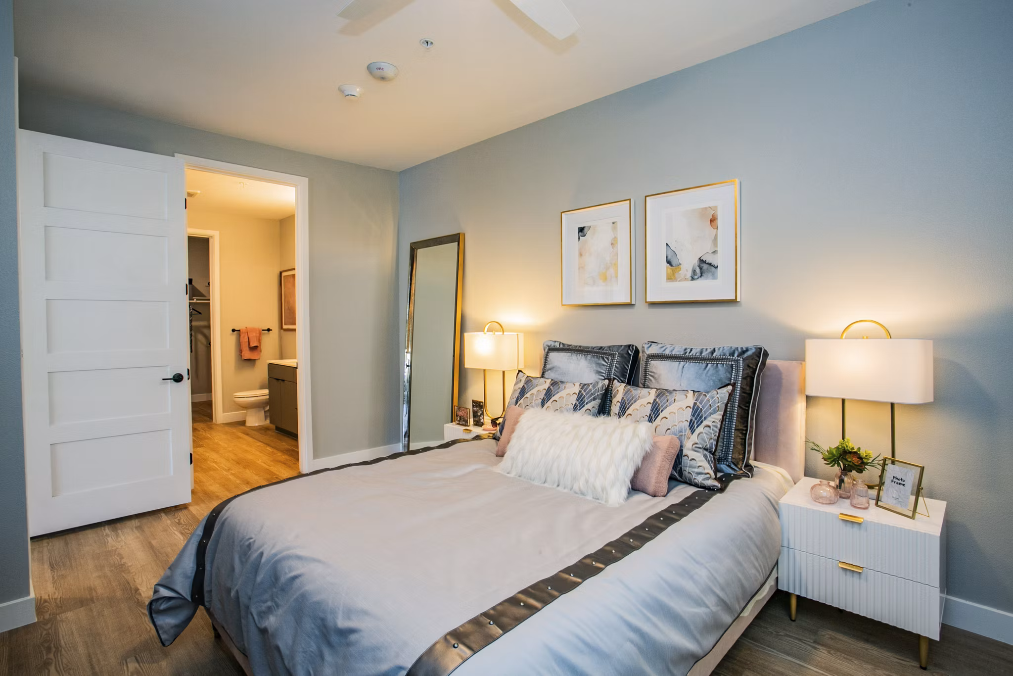 Spacious bedroom with modern decor at Tanager Echo Apartments, highlighting luxury living features