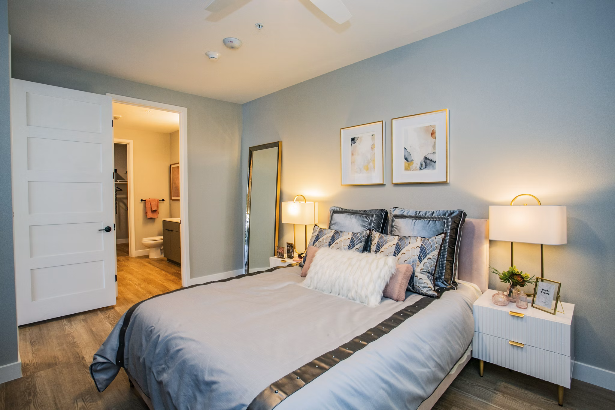 Spacious bedroom with modern decor at Tanager Echo Apartments, highlighting luxury living features