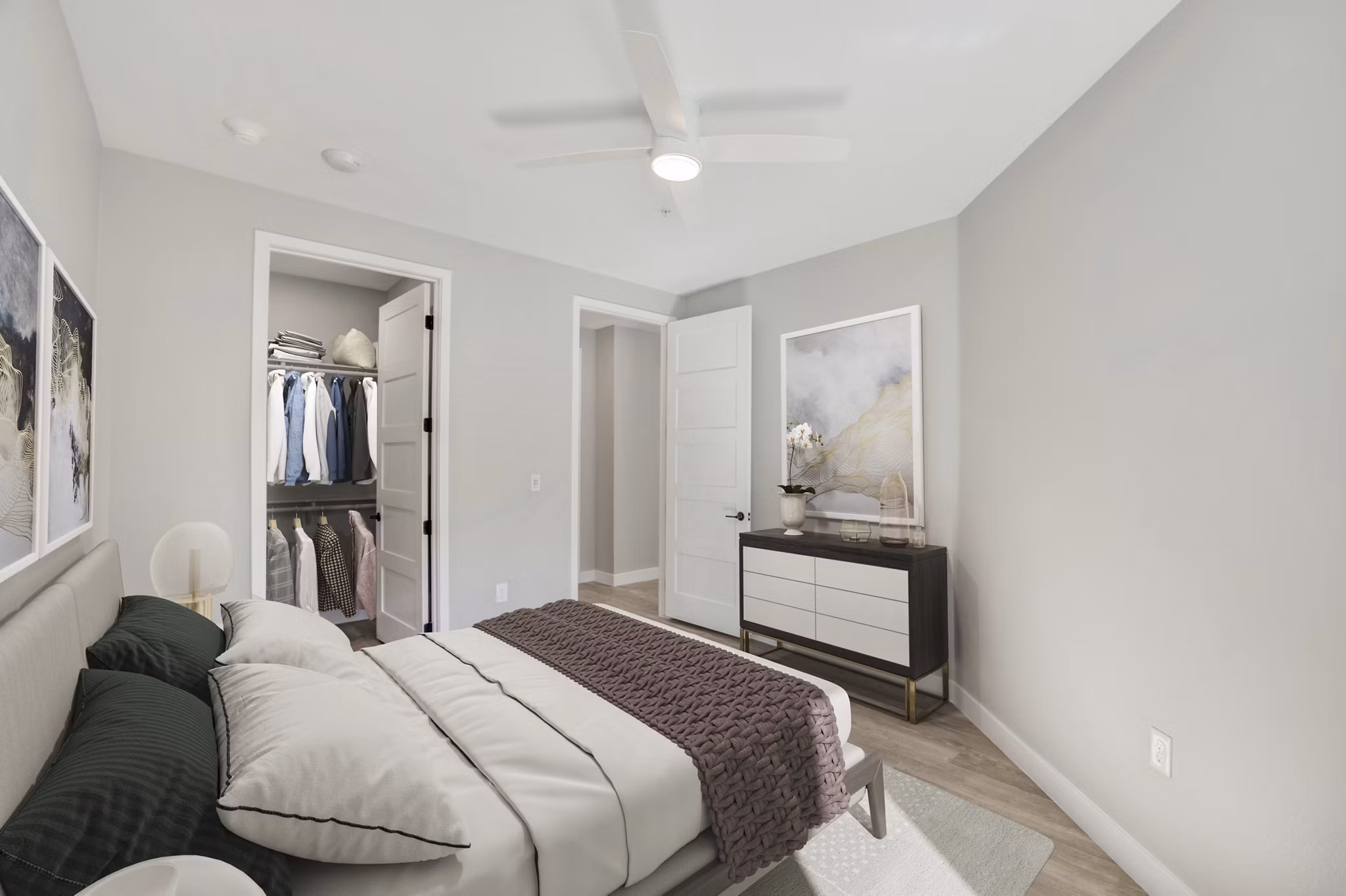 Spacious bedroom with modern decor at Tanager Echo Apartments
