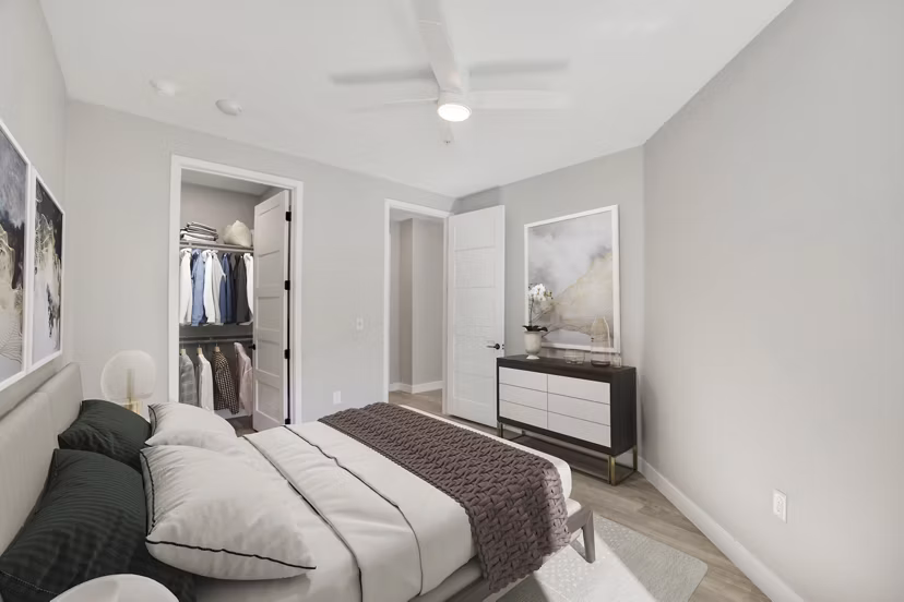 Spacious bedroom with modern decor at Tanager Echo Apartments
