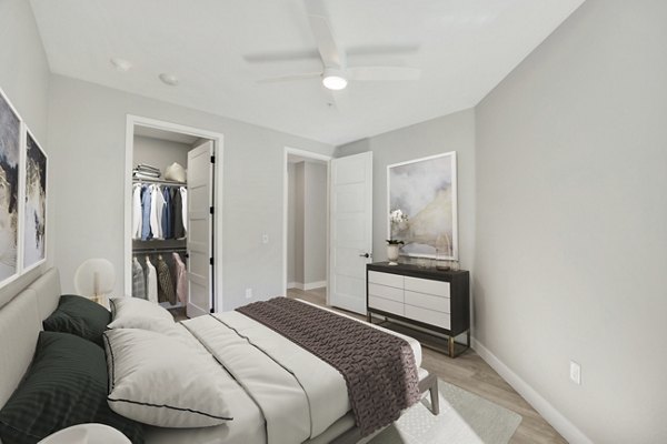 Spacious bedroom with modern decor at Tanager Echo Apartments