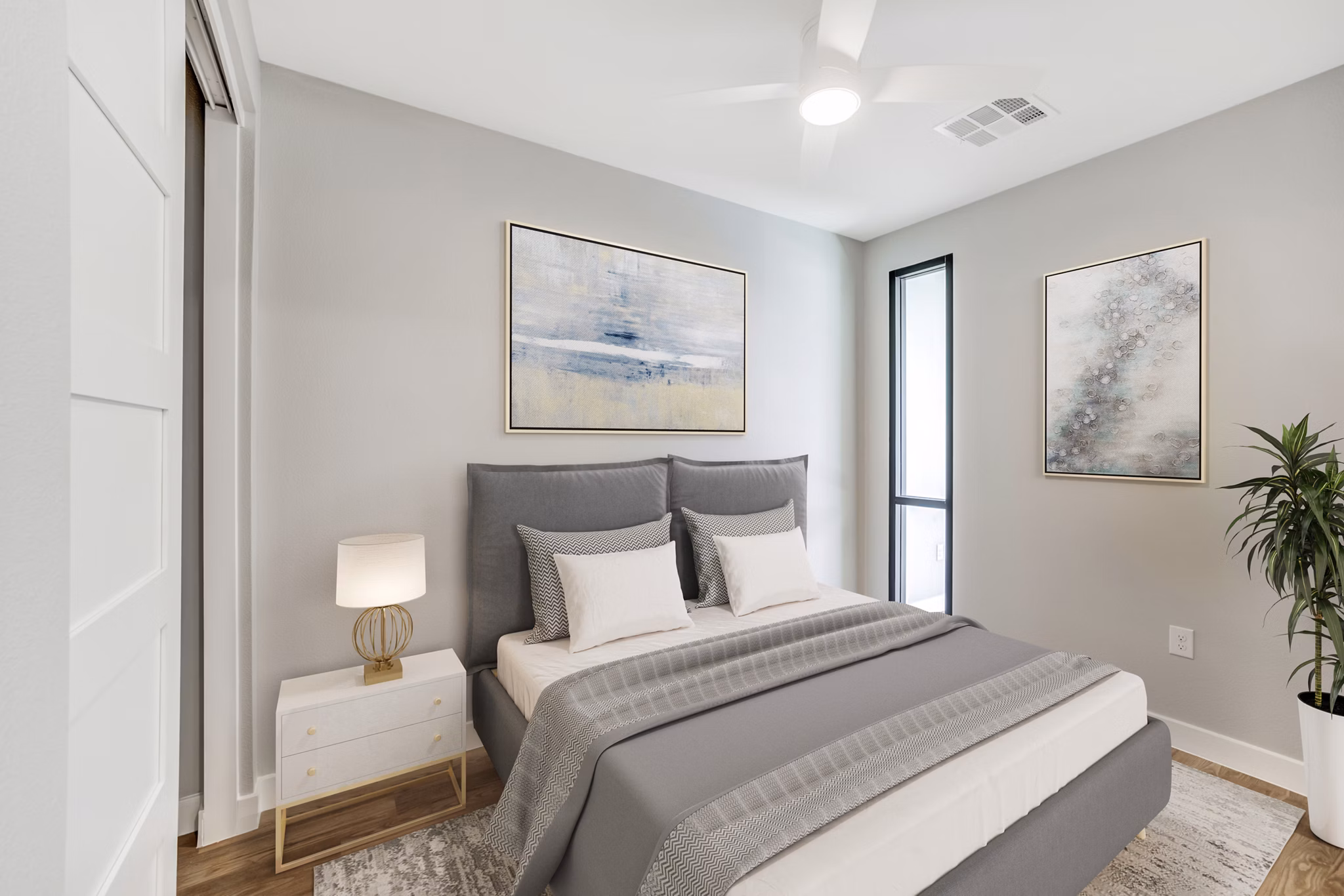 Tanager Echo Apartments: Contemporary bedroom with stylish decor and expansive windows