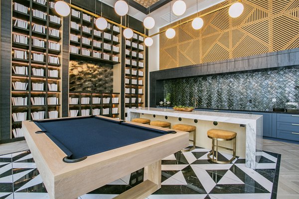 Elegant clubhouse at Tanager Echo Apartments featuring modern design and luxury seating for upscale social gatherings