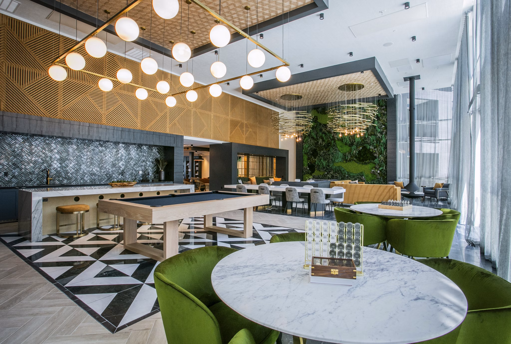 Elegant clubhouse with stylish seating and modern decor at Tanager Echo Apartments, perfect for socializing and relaxation