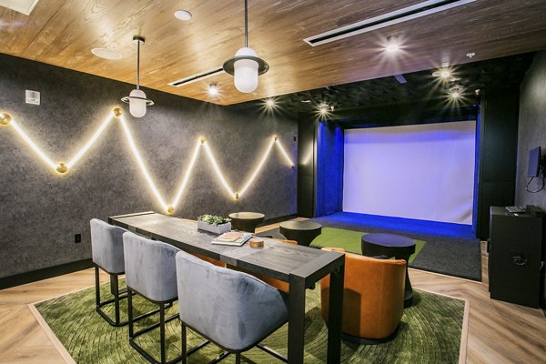 Clubhouse featuring modern design and comfortable seating at Tanager Echo Apartments
