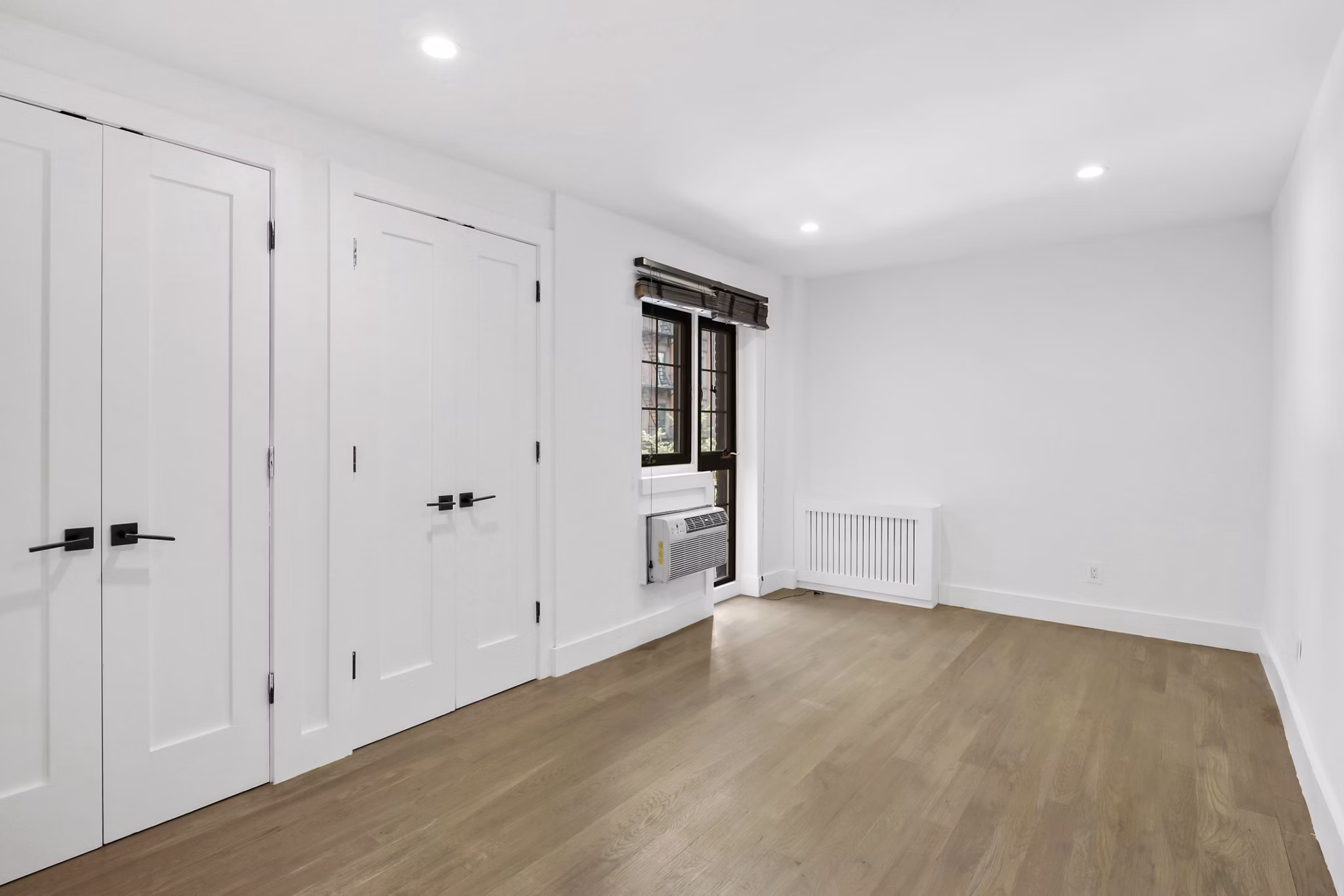 bedroom at 51 Irving Apartments