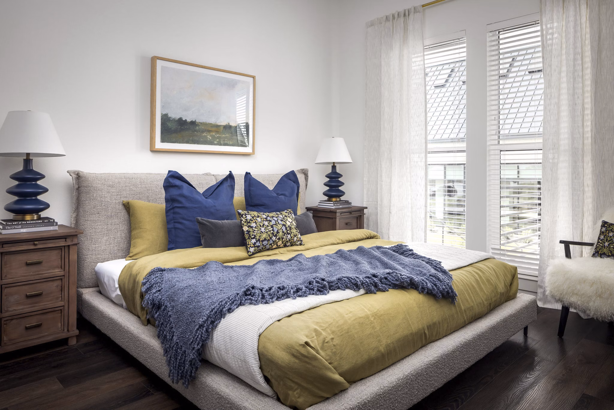 Modern bedroom with stylish decor at Adaline at the Station Apartments