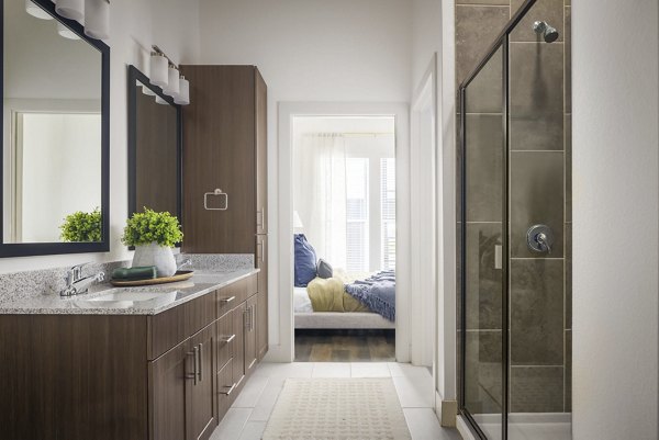 Bathroom featuring modern fixtures in Adaline at the Station Apartments