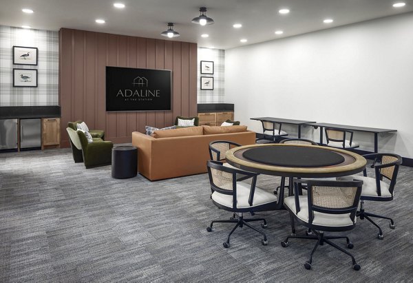 Modern clubhouse featuring luxury seating and entertainment spaces at Adaline at the Station Apartments