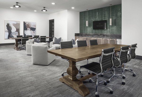 Clubhouse featuring modern decor and ample seating at Adaline at the Station Apartments