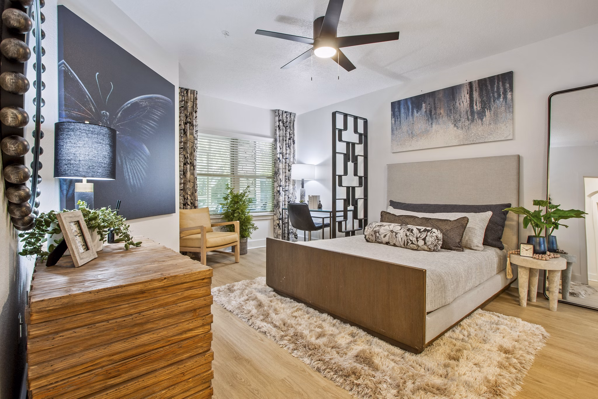 Contemporary bedroom with stylish decor at Adara at Godley Station Apartments