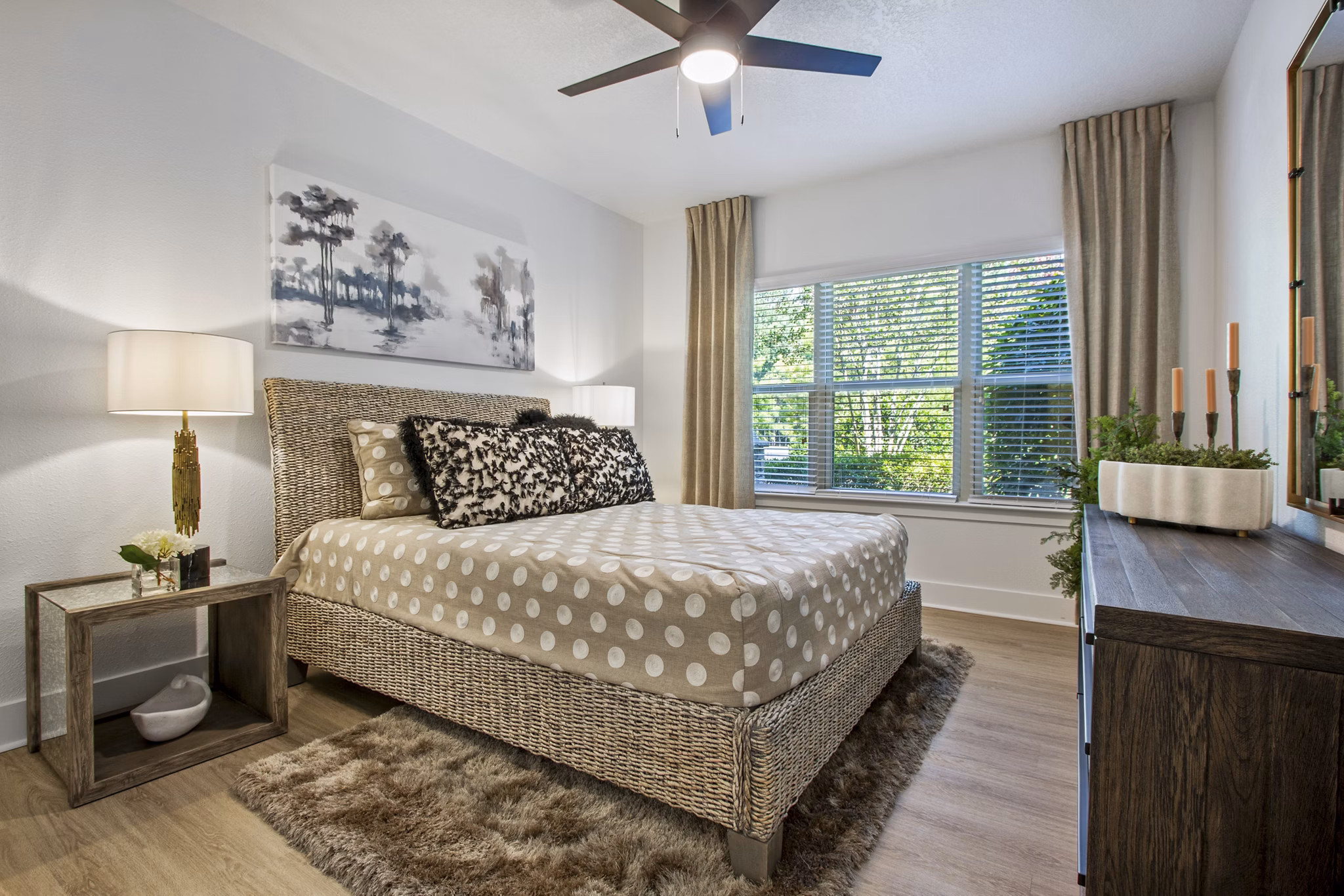 Bedroom featuring contemporary decor and cozy ambiance at Adara at Godley Station Apartments