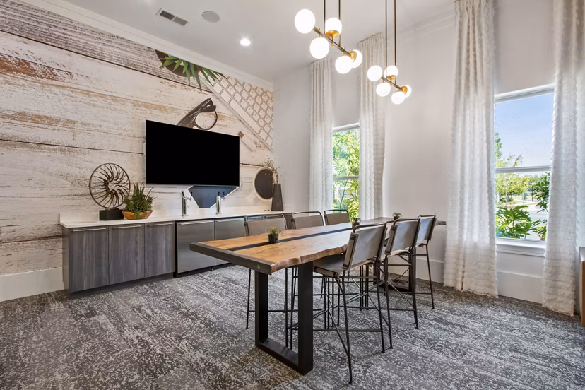 Contemporary clubhouse featuring modern decor at Adara at Godley Station Apartments