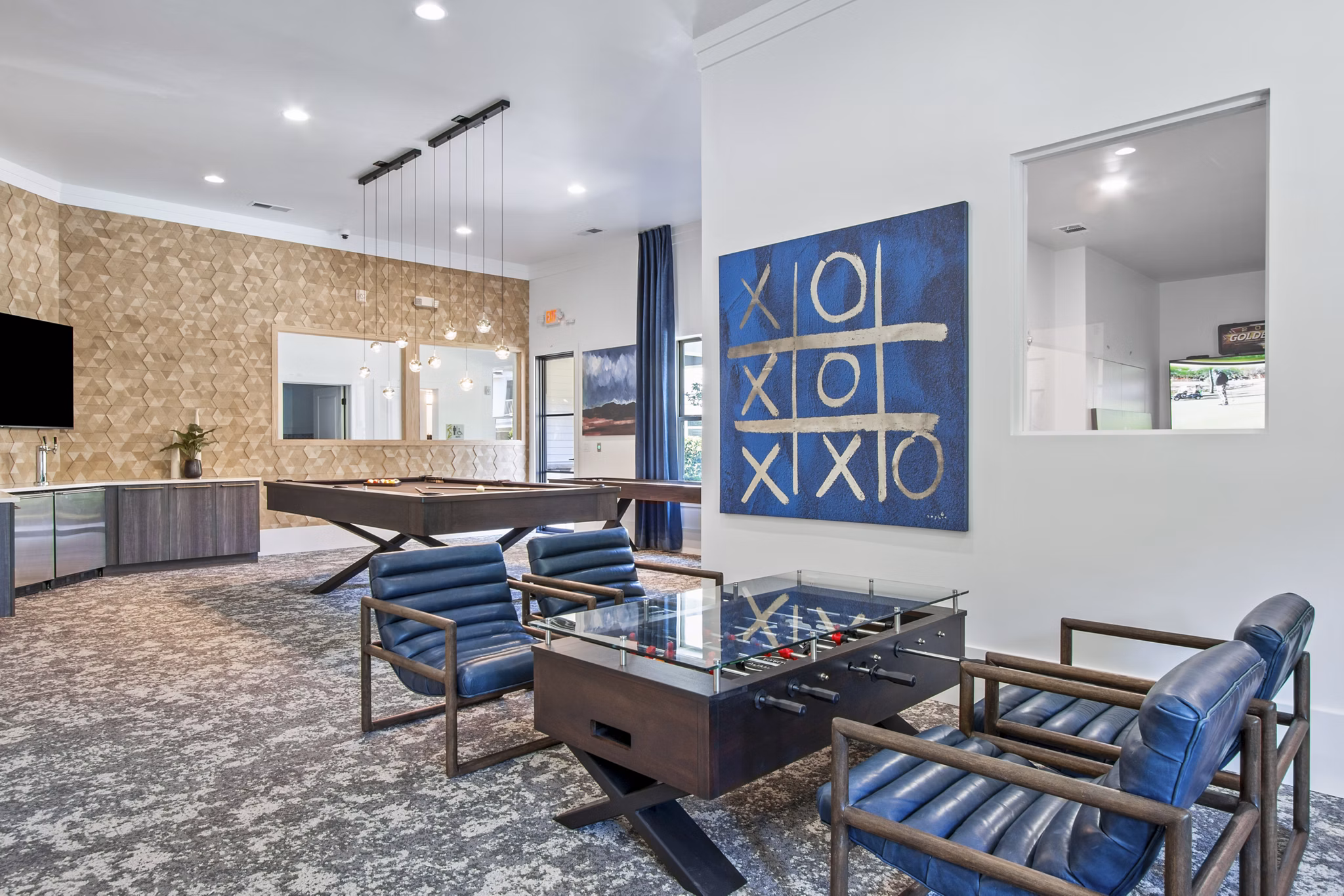 Game room featuring pool table and lounge seating at Adara at Godley Station Apartments
