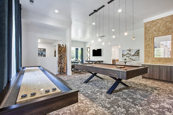 game room at Adara at Godley Station Apartments