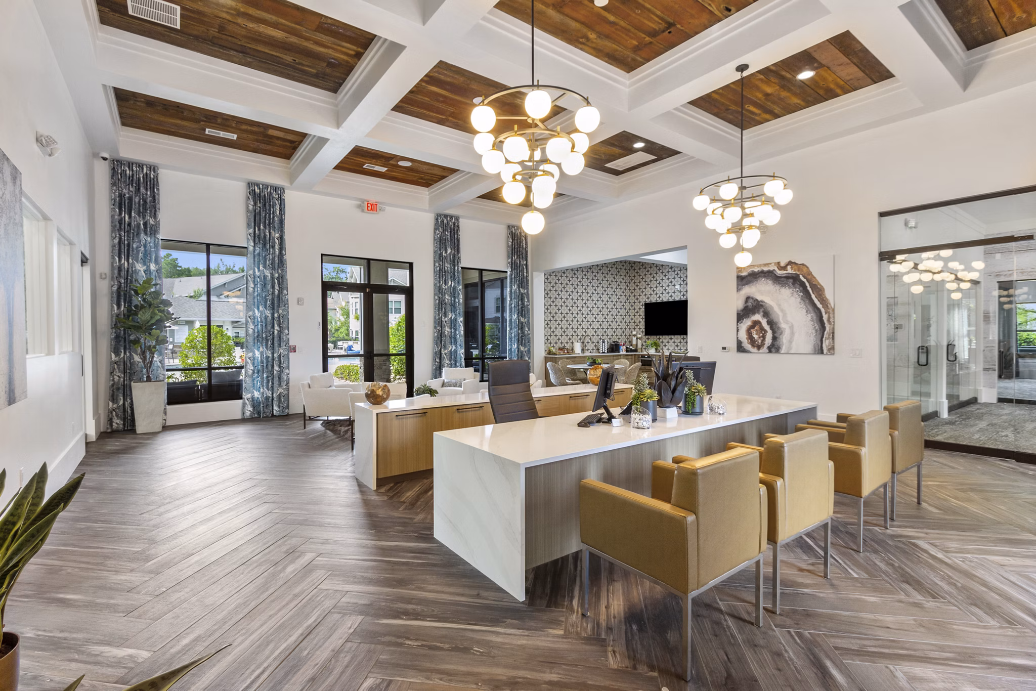 Clubhouse with modern decor and ample seating at Adara at Godley Station Apartments