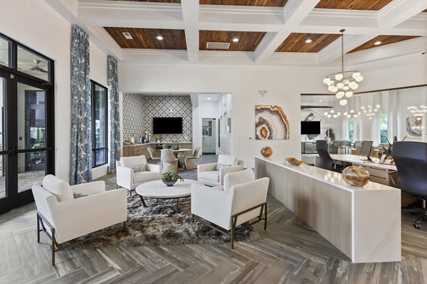 Luxury clubhouse at Adara at Godley Station Apartments with modern lounge spaces and community features in Pooler