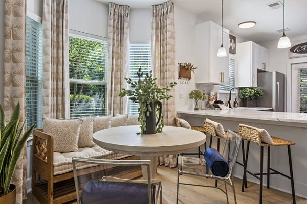 Dining area featuring modern decor and ample seating at Adara at Godley Station Apartments