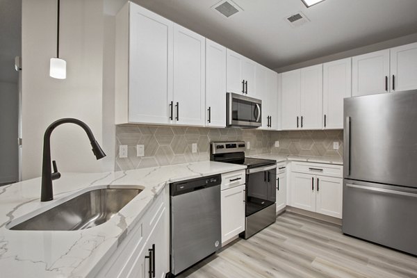 kitchen at Adara at Godley Station Apartments