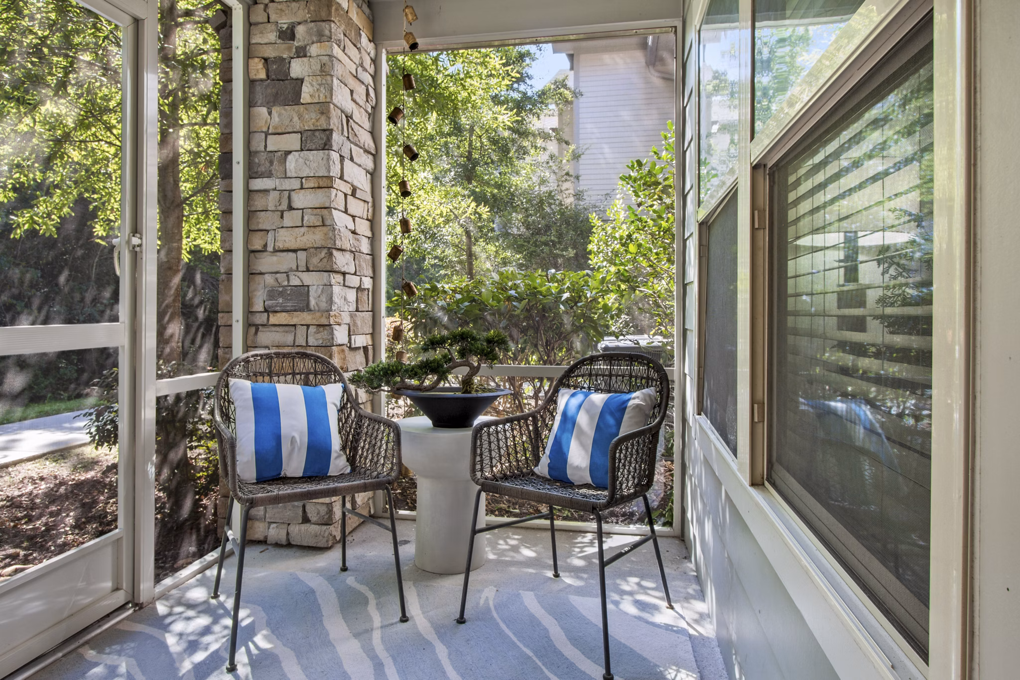 Spacious patio with modern seating at Adara at Godley Station Apartments